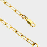 18k gold plated over sterling silver paper clip chain choker. The choker is composed of interlocking paper clip-shaped links, with each link carefully plated in 18k gold for a luxurious and radiant shine. The paper clip chain design gives the necklace a trendy and contemporary look. The choker is designed to sit comfortably around the neck, creating a stylish and fashionable accessory that can be worn alone or layered with other necklaces