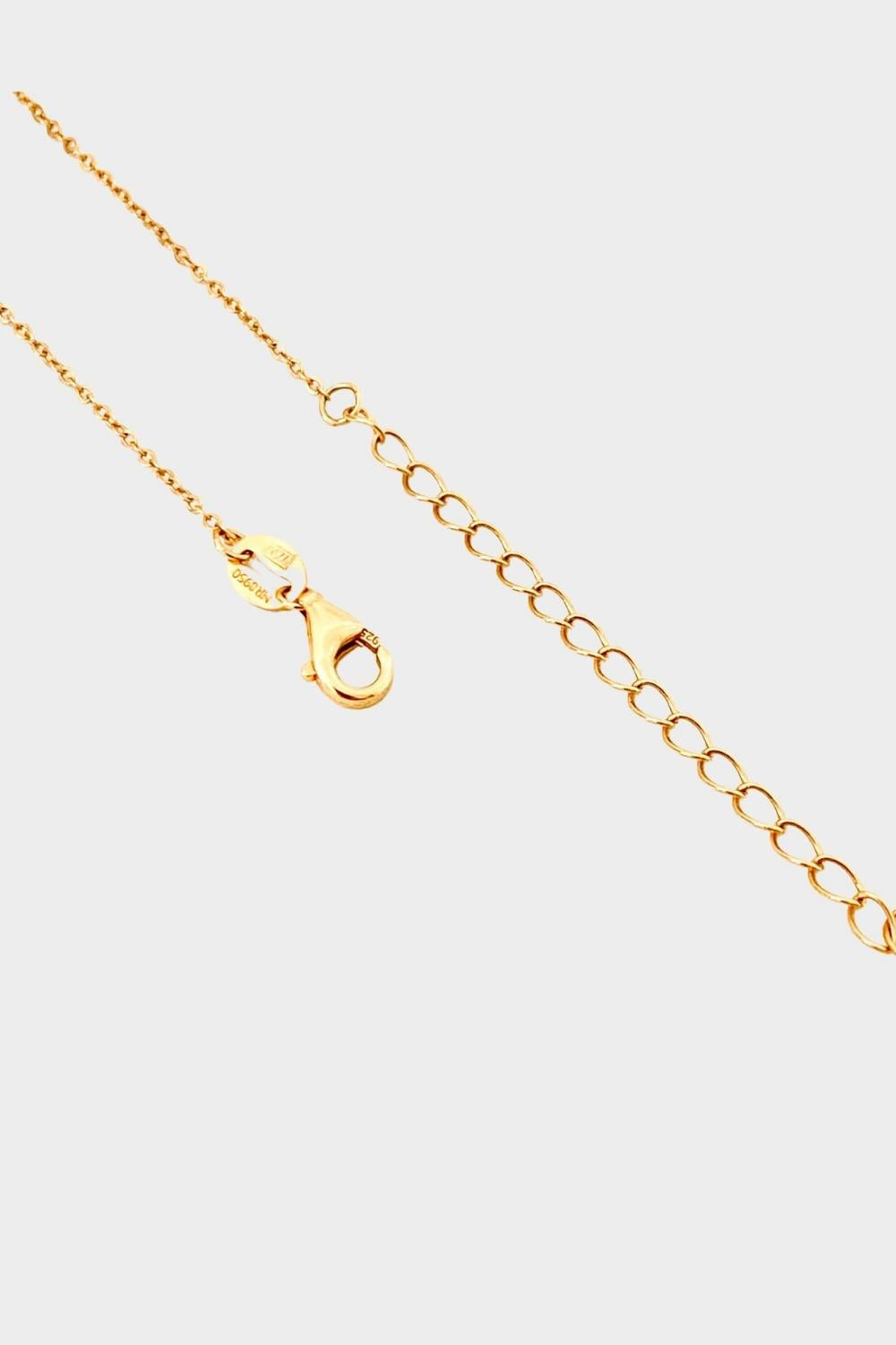Waterproof 18k gold plated chain necklace with an extender. The necklace features a delicate and shiny gold chain with small interlocking links. The chain has an additional extender attached, allowing for adjustable length options. The extender is made of the same gold material and features a small lobster clasp for easy attachment and removal. This versatile necklace can be worn at different lengths to suit individual preferences.