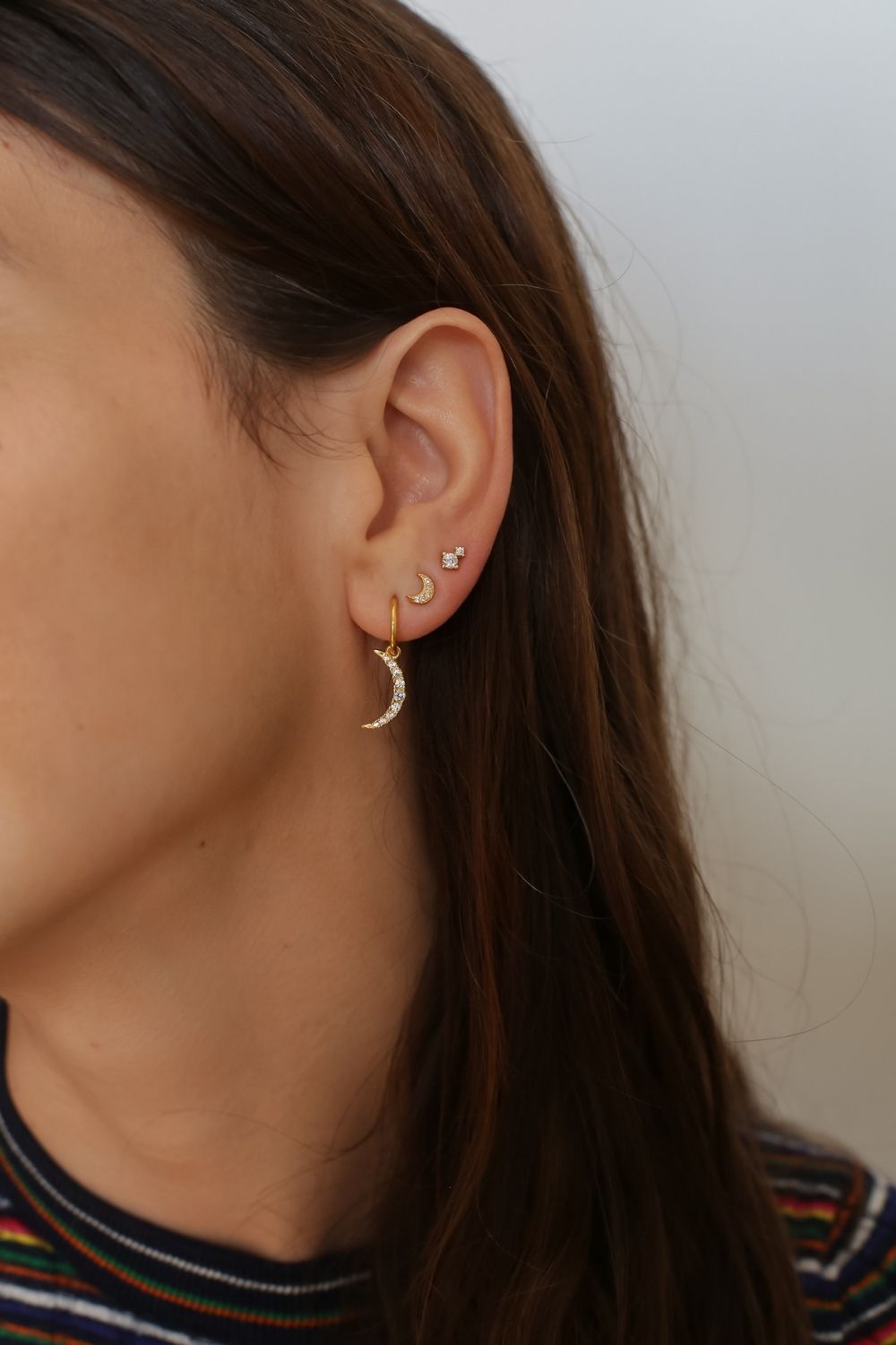 delicate 24k gold vermeil moon-shaped stud earrings, perfect for adding a touch of celestial elegance to any outfit