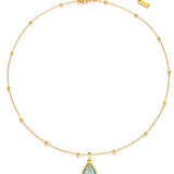 Gold necklace with a amazonite pendant on a white background