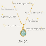 Gold necklace with a green pendant on a white background, featuring AMICA Jewels branding.