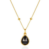 Gold black obsidian necklace with a pendant on a white background