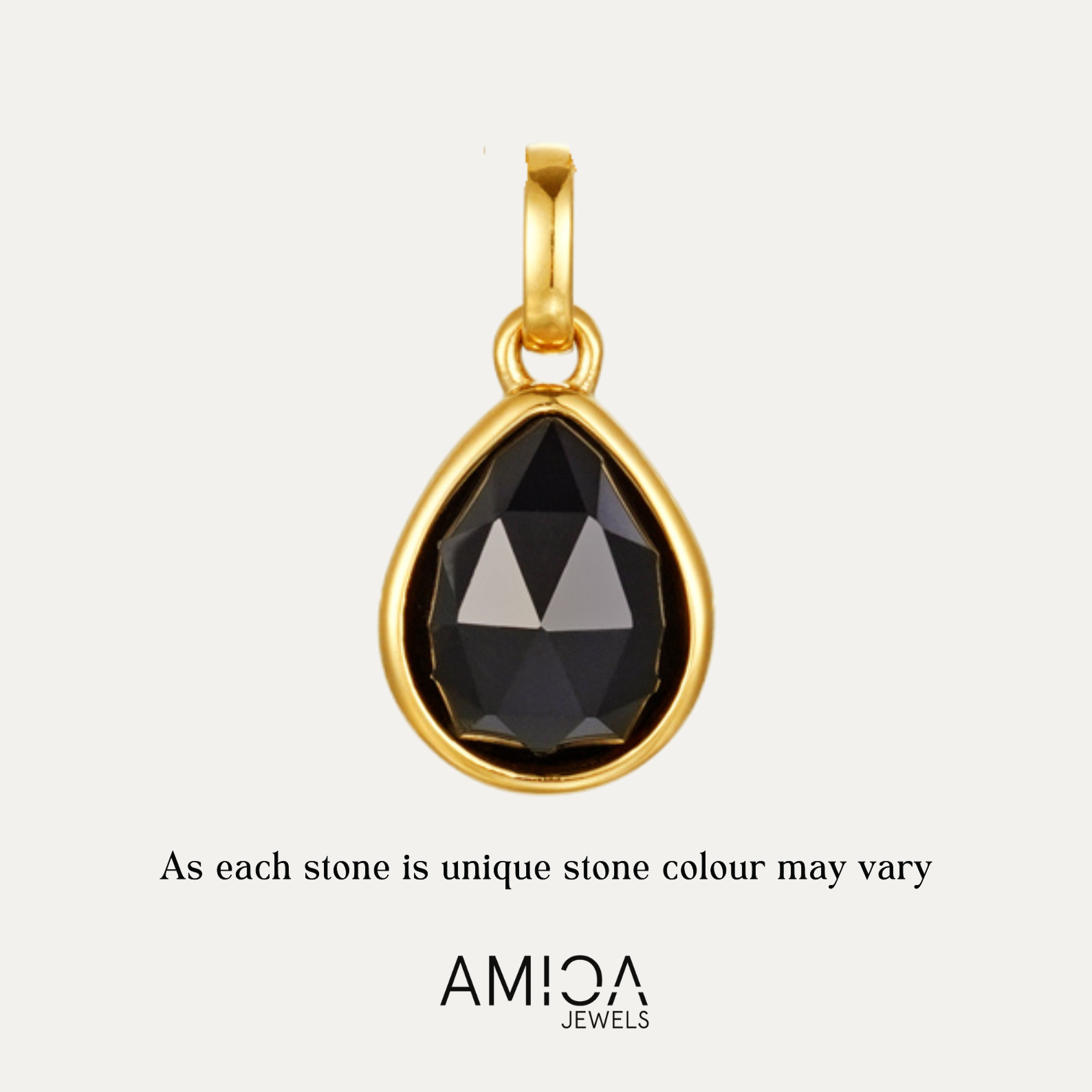 Gold pendant with a black teardrop-shaped gemstone on a light gray background, featuring the AMICA Jewels brand.