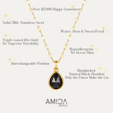 Gold necklace with black pendant and AMICA Jewels branding on a white background