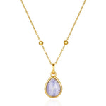 blue lace gold teardrop pendant on the white background