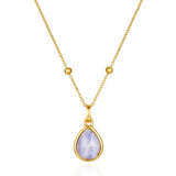 blue lace gold teardrop pendant on the white background
