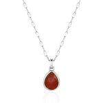 Necklace with a teardrop-shaped red pendant on a white background