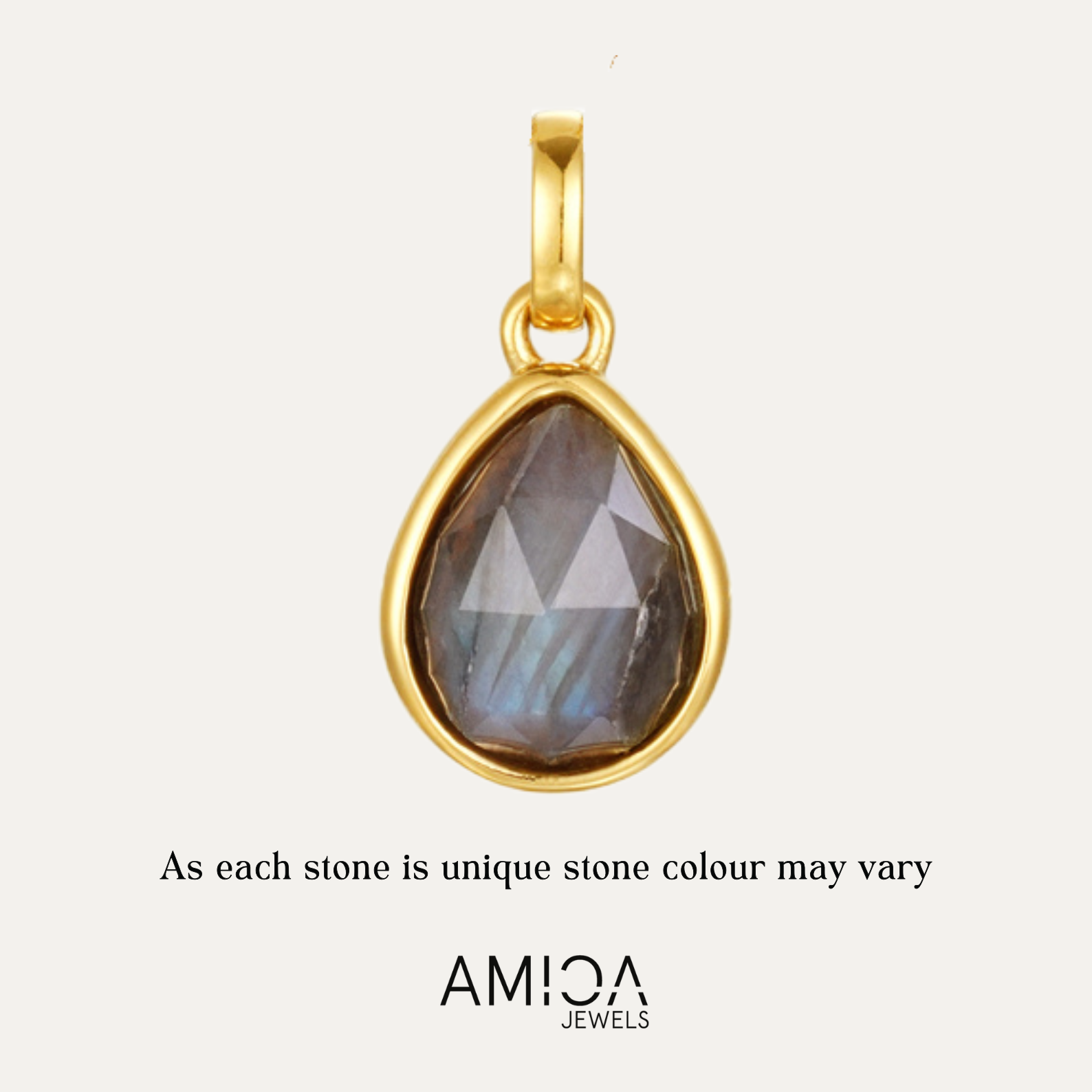 Gold pendant with a teardrop-shaped gemstone on a light gray background, featuring the AMICA Jewels brand.