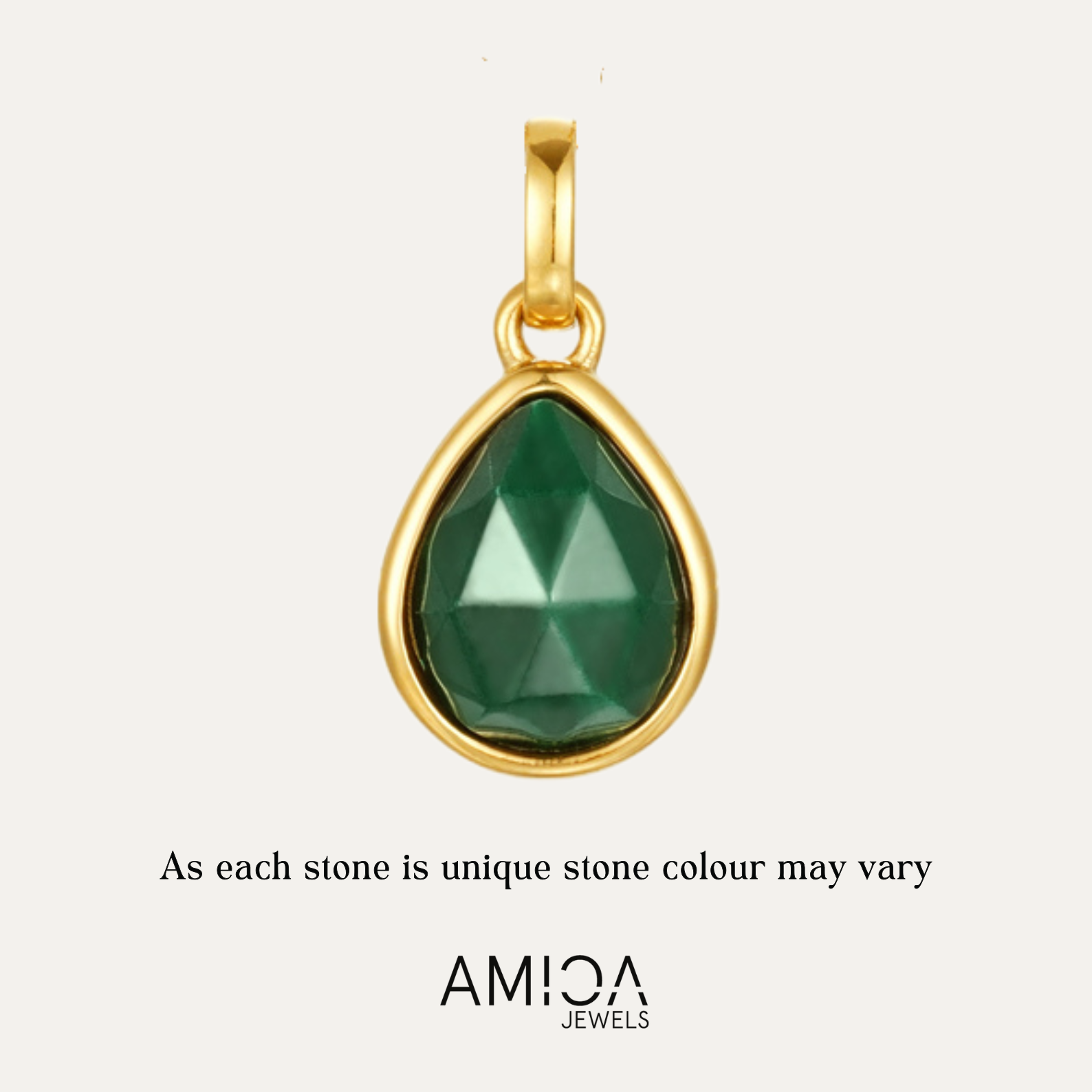 Gold pendant with a green gemstone on a light gray background, featuring the AMICA Jewels brand.