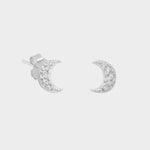 delicate silver moon-shaped stud earrings, perfect for adding a touch of celestial elegance to any outfit