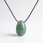 Green Aventurine egg-shaped pendant necklace photographed on a white background
