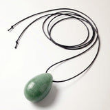 Green Aventurine egg-shaped pendant necklace photographed on a white background