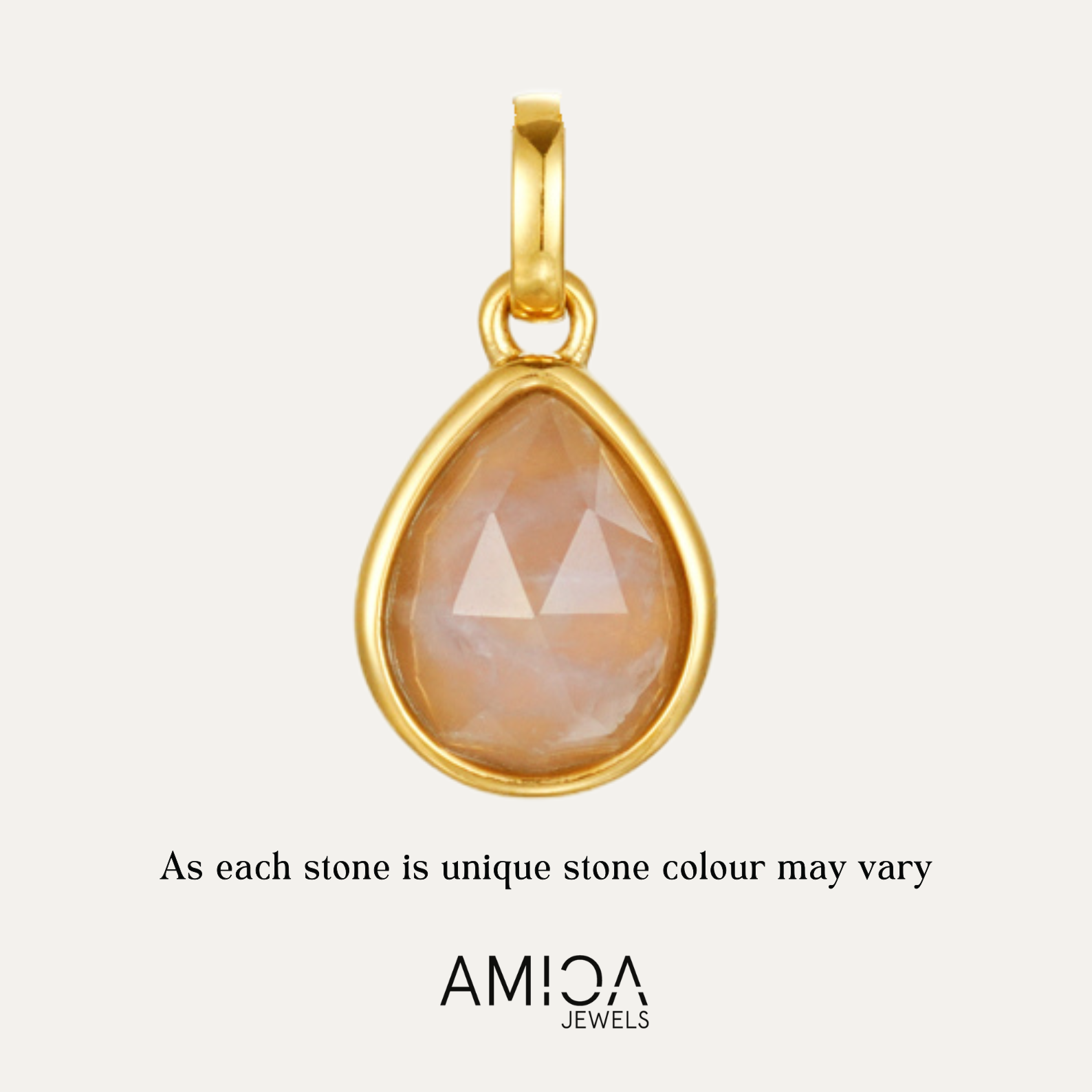 Gold pendant with a teardrop-shaped stone on a light beige background, featuring the AMICA Jewels brand.
